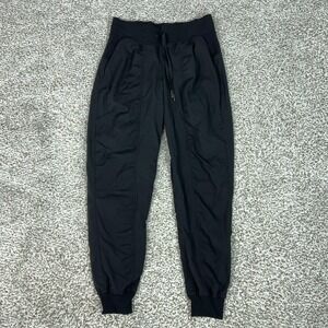 Lululemon Pants Womens 6 Black Jogger Dance Stuido Tapered Pockets Yoga Gym Logo